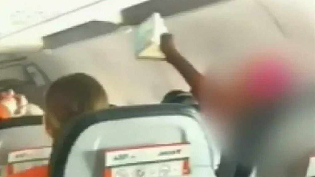 Jetstar passenger escorted off flight for violent outburst, making children cry