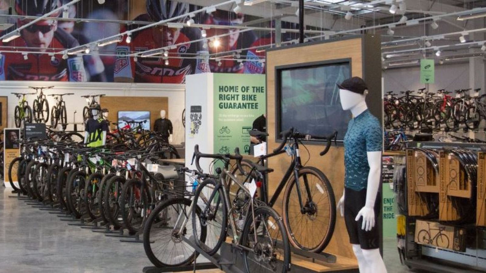 Halfords rides to rescue of struggling rival Evans Cycles