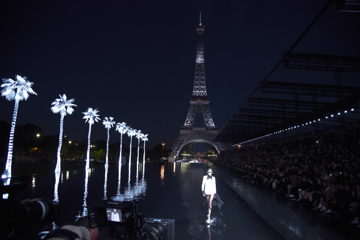 Models walk on water at Paris Fashion Week show