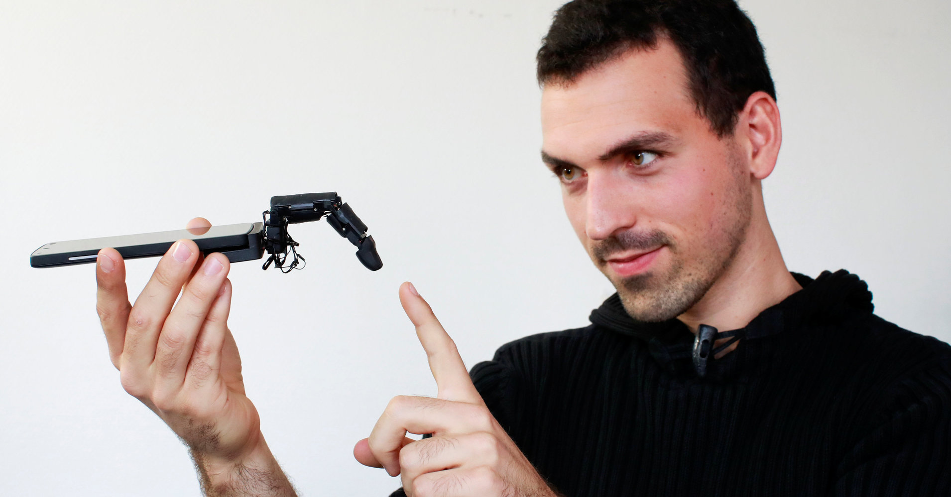 Does Your Phone Really Need A Creepy Robot Finger Attached To It?