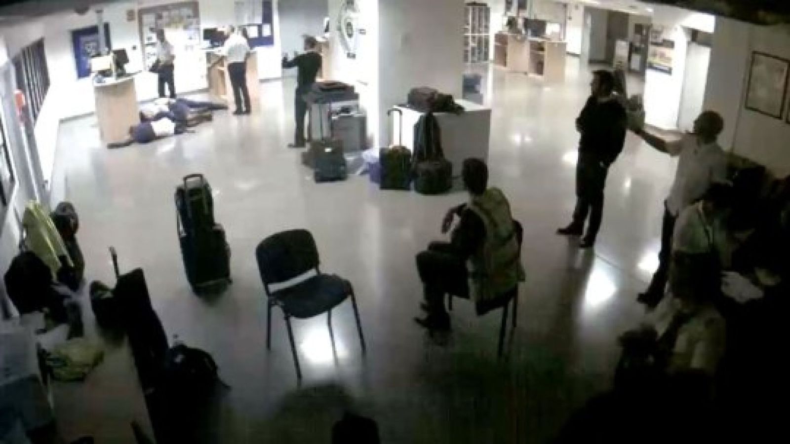 Ryanair sacks six crew members over photo of them sleeping on Spanish airport floor