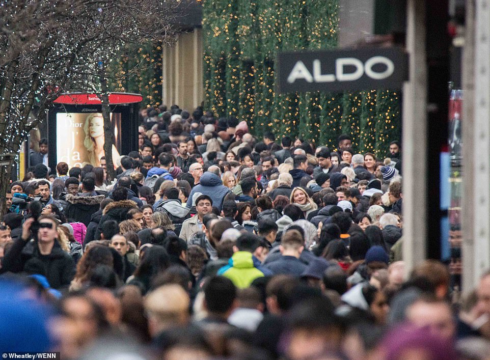 Thousands of bargain hunters queue from MIDNIGHT ahead of Boxing Day sales