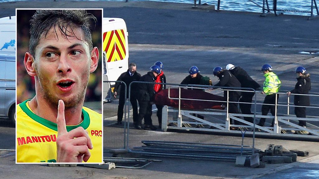 Team working on soccer star Emiliano Sala’s plane crash carry body onshore after pulling it from wreckage