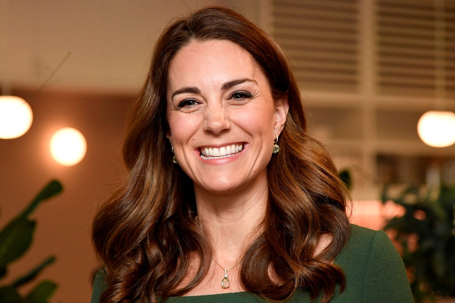 Kate Middleton glows in an emerald dress by Emilia Wickstead