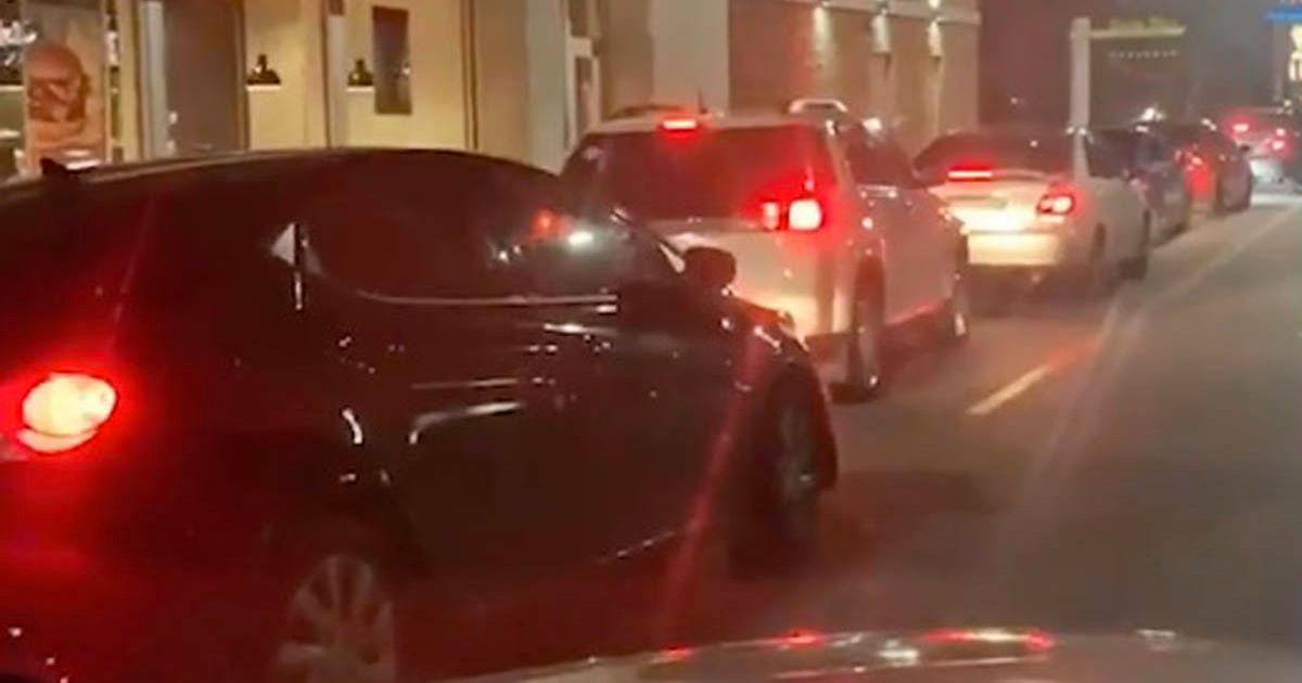 McDonald’s addicts queue up at a closed drive thru counter on Christmas Day