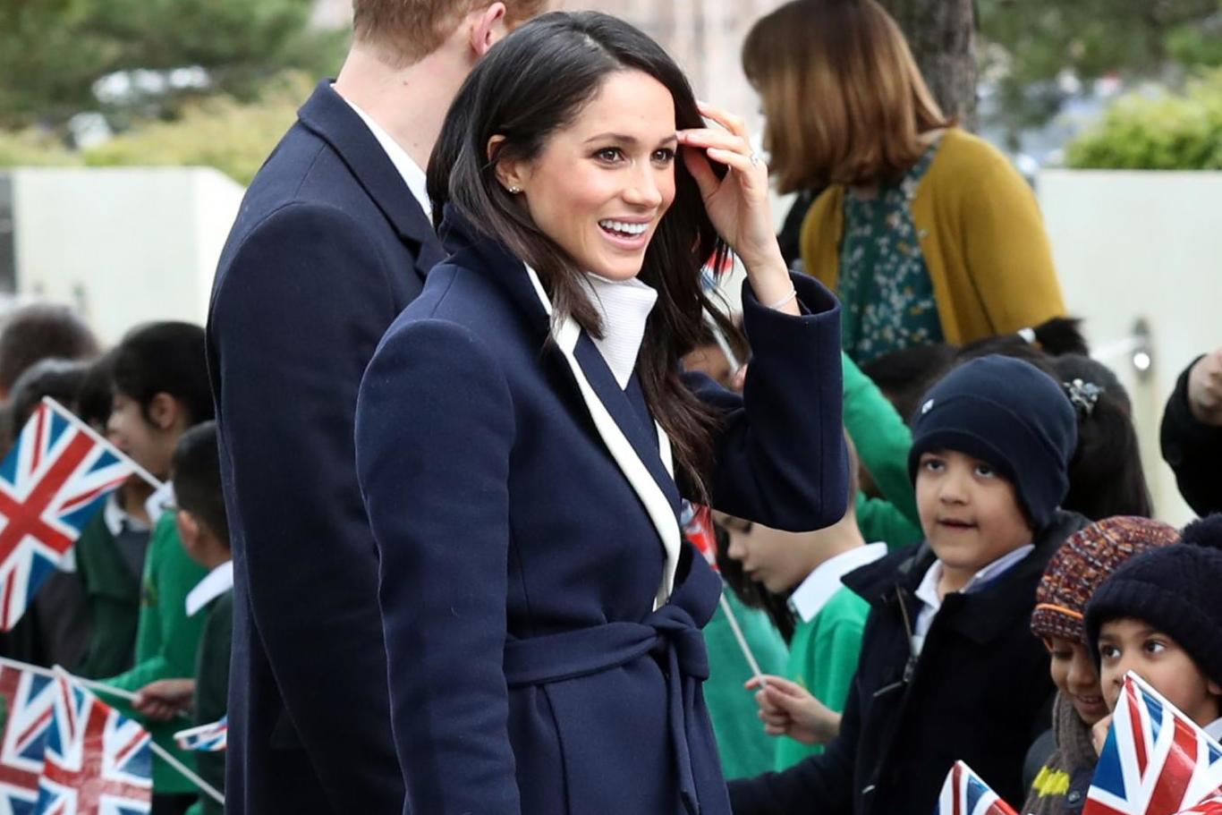 Meghan Markle recycles All Saints jumper for the Sussex’s digital Christmas card