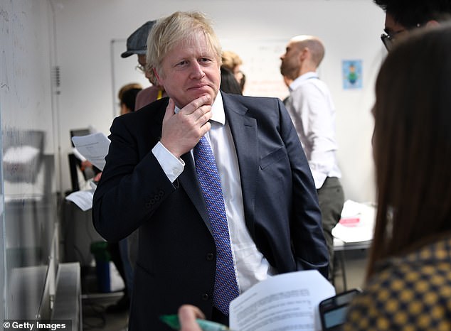 Boris Johnson defies US fury and Tory backbenchers to approve 5G role for Huawei