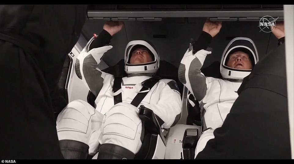 NASA astronauts are strapped in for SpaceX rocket launch after giving farewell air hugs