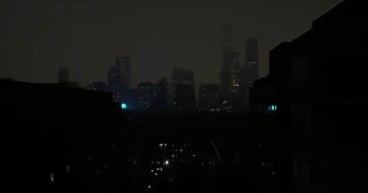 Eerie moment Beijing sky turns pitch black in the middle of the day