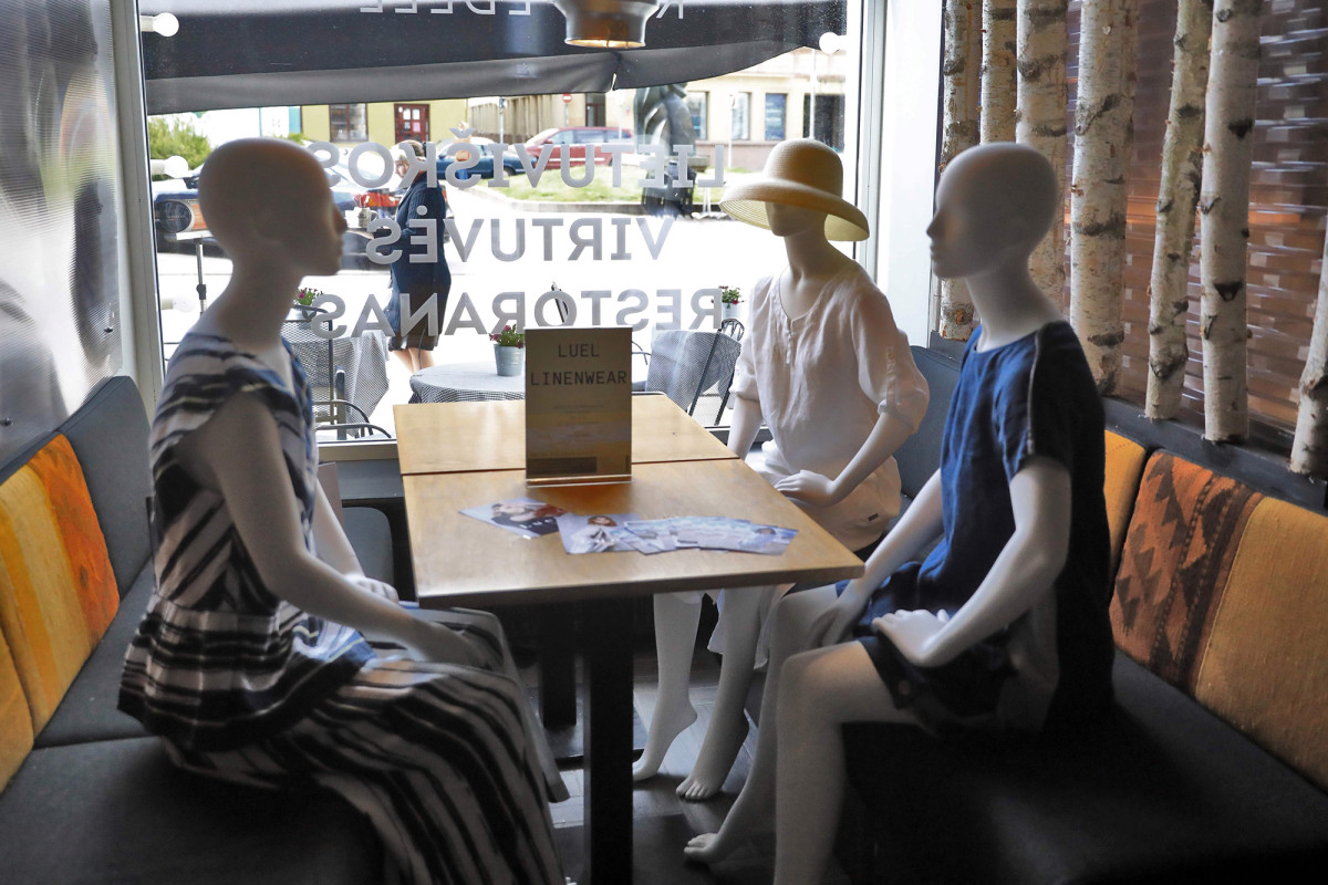 Lithuania restaurants using mannequins at empty tables to model local designers’ fashions