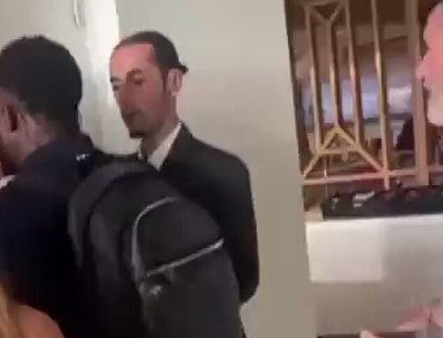 Micah Richards breaks his silence after he was filmed pinning a man against the wall moments after Roy Keane was ‘headbutted by a fan at Arsenal’s Emirates Stadium’