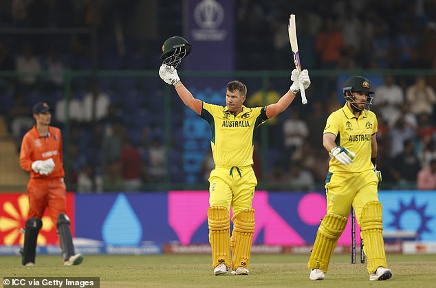 David Warner hits stunning century to put Australia in control of Cricket World Cup clash with the Netherlands… but was he lucky to survive this ‘dropped’ catch?