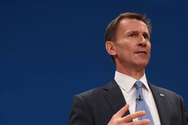 Chancellor Jeremy Hunt's awkward photo blunder where people winced over unfortunate sign