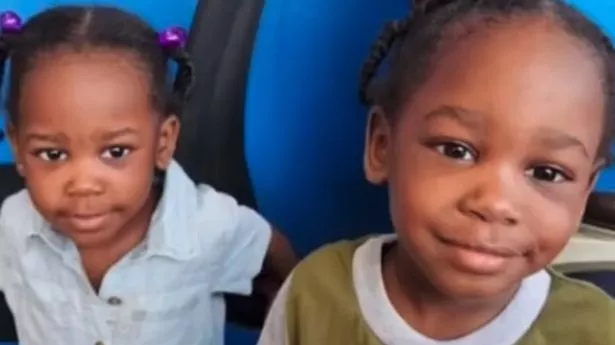 Twin toddlers found foaming at the mouth die after mum tries to jump onto railway track