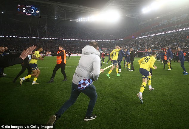 Girlfriend of Fenerbahce player attacked with a CORNER FLAG by rival fans in violent scenes in Turkey reveals concern for her partner: ‘My heart stopped for a minute’
