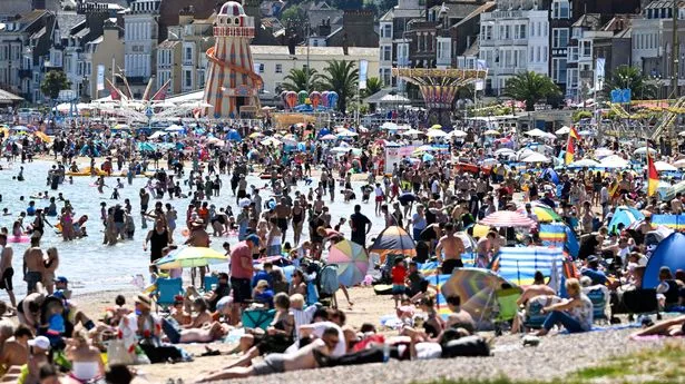 Weather splits UK in two as Met Office says half get 30C heatwave as others face downpours