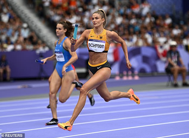 Alica Schmidt, dubbed the ‘world’s sexiest athlete’, crashes OUT of the Olympic women’s 4x400m relay heats as Germany fail to reach the final