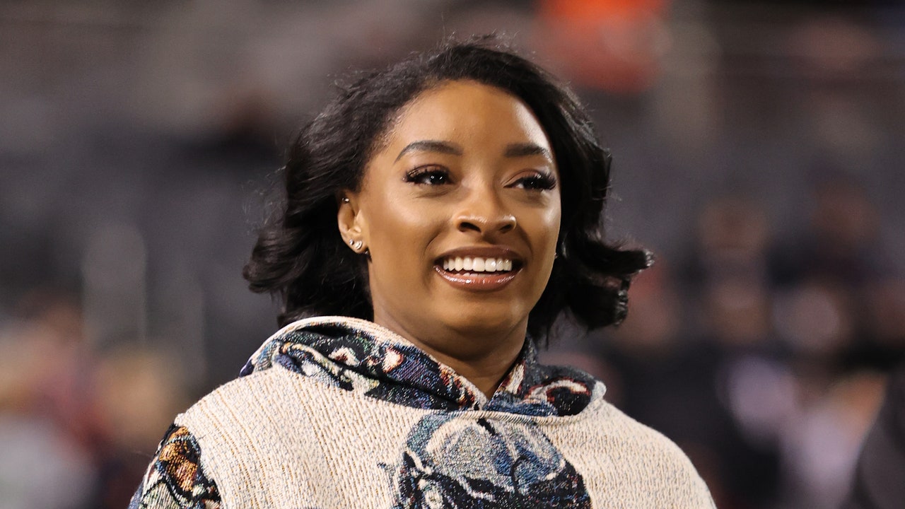 Simone Biles Took WAG Style to the Next Level by Wearing Jonathan Owens’ Face All Over Her Body