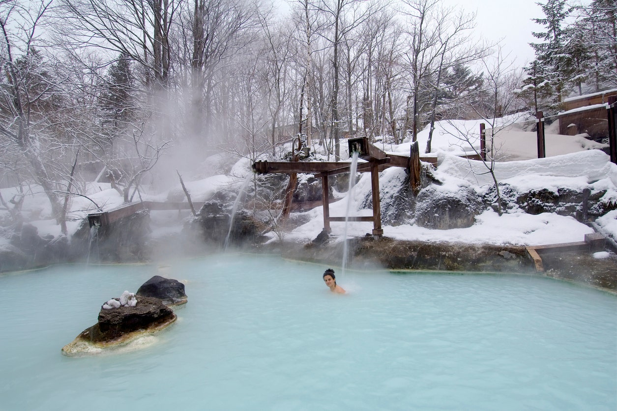 Japan officials raising tax on hot springs bathing as country sees tourism boom