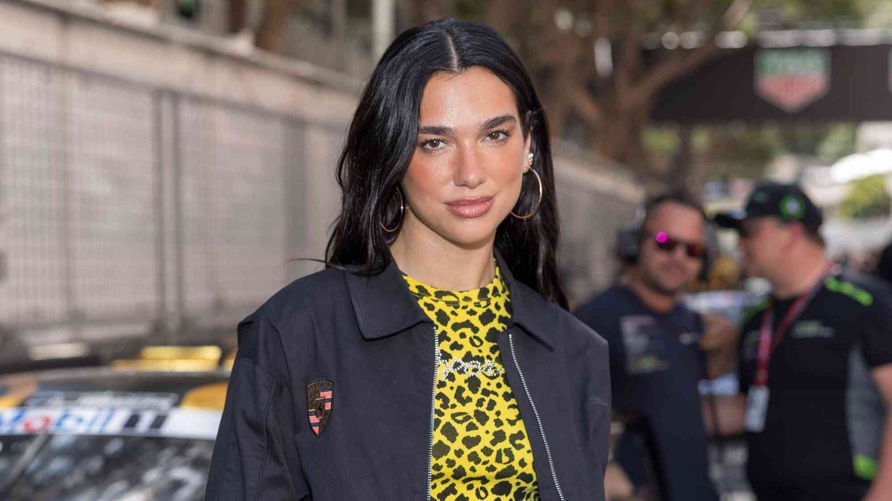 Dua Lipa Accelerates This DIY Jeans Trend With Her Favorite Sporty Sneaker