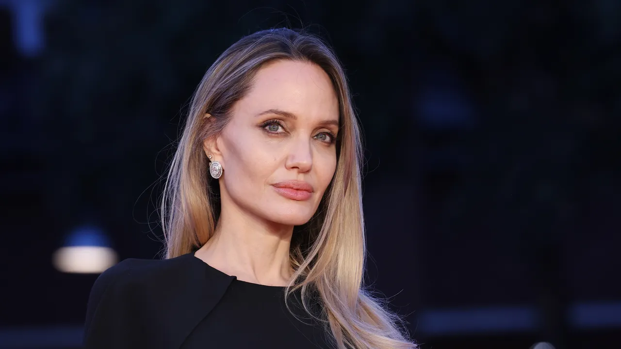Angelina Jolie Just Put a Tattoo-Baring Twist on One of Fall’s Biggest Trends