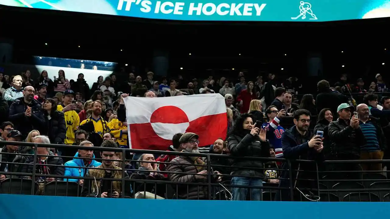 Fans raise Greenland’s flag to protest US Olympic hockey win over Denmark