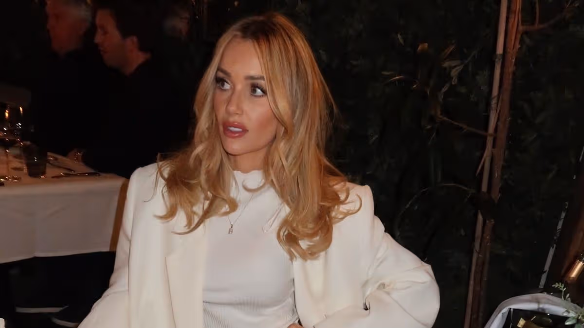 Love Island’s Laura Anderson stuns in tiny satin shorts after split with footballer ex
