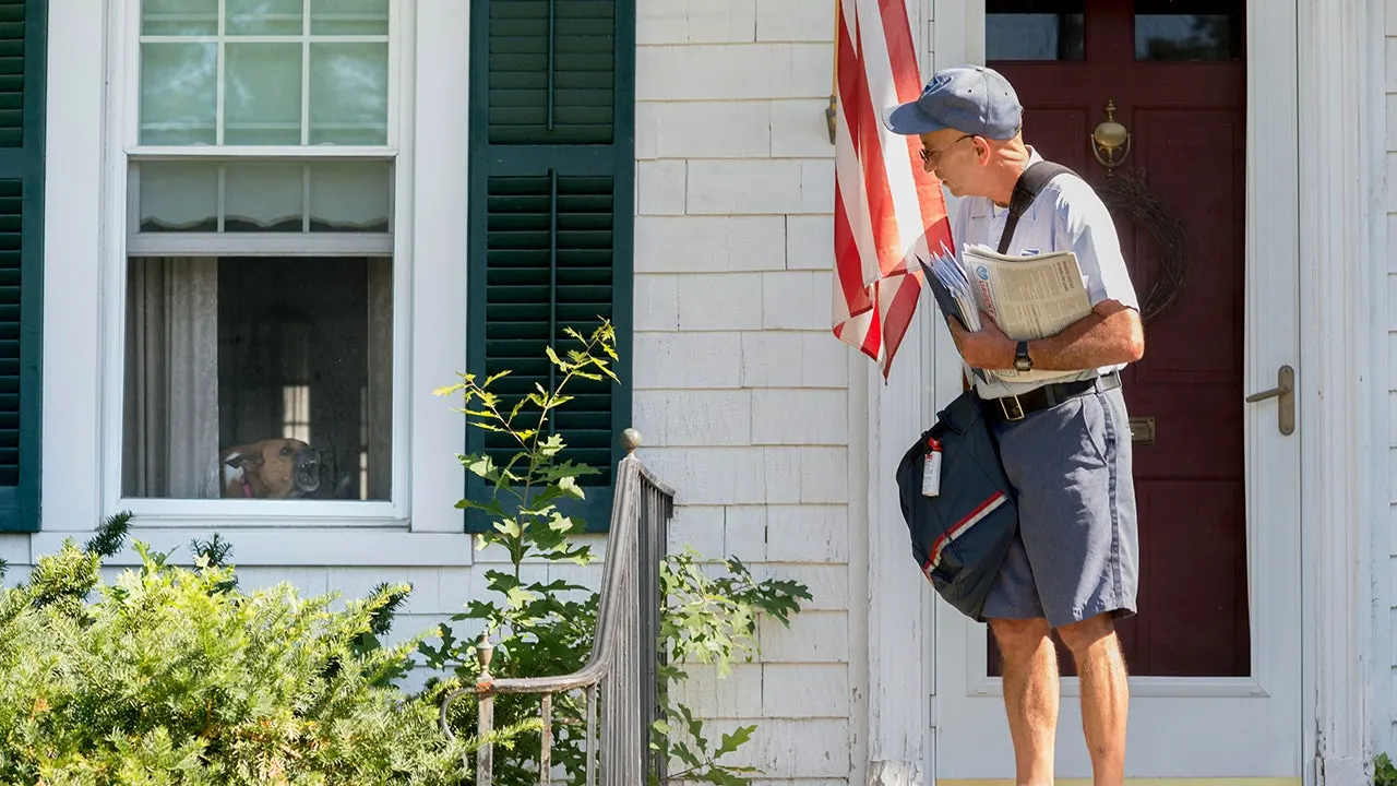 Dog owners are warned by postal service after 5,200 workers attacked last year