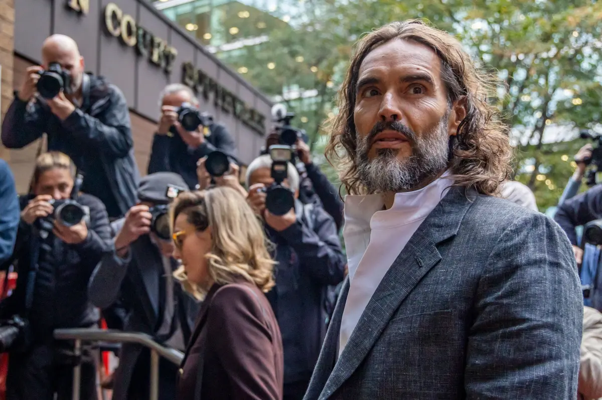 Russell Brand arrives at a London court for his trial on rape and sexual assault charges