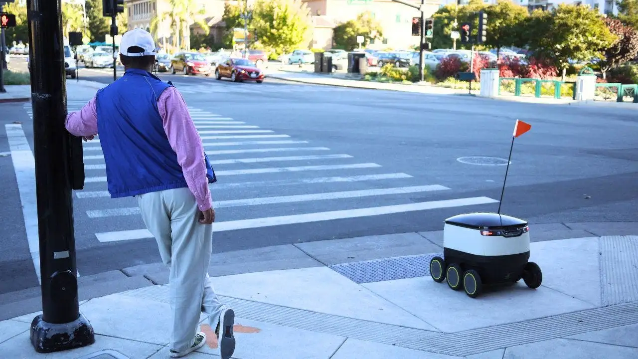 Retired professor arrested in Philadelphia for protesting delivery robot
